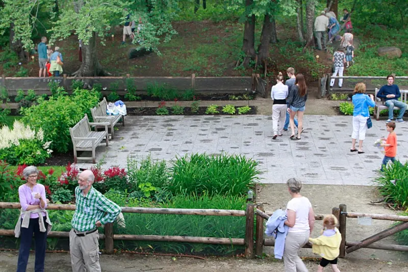 Visitors enjoying the garden terrace at Highfield