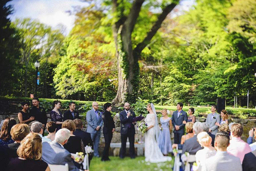 An outdoor wedding ceremony in the Highfield gardens